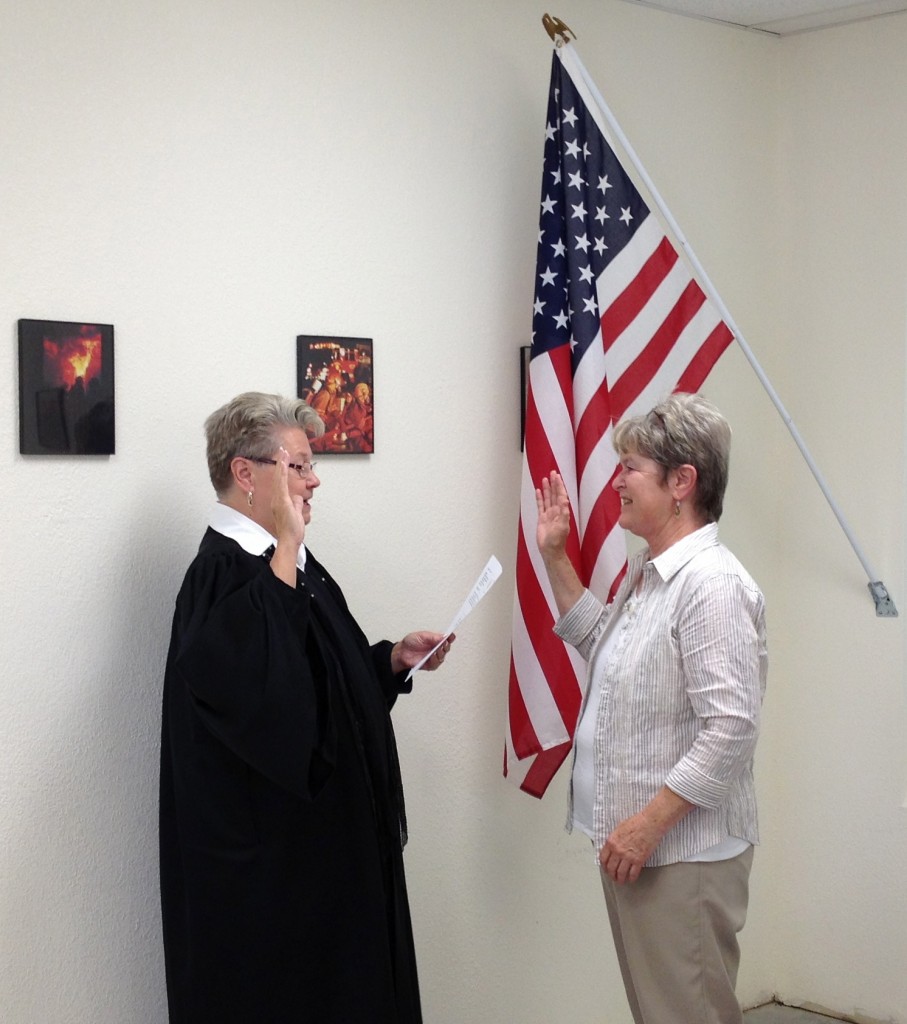 Susan also serves on the new Coupland City Council. Here she is taking her oath of office.