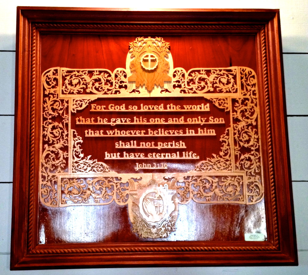 One of several hand-carved plaques in the sanctuary, made by John W. Thompson of Taylor, Texas.